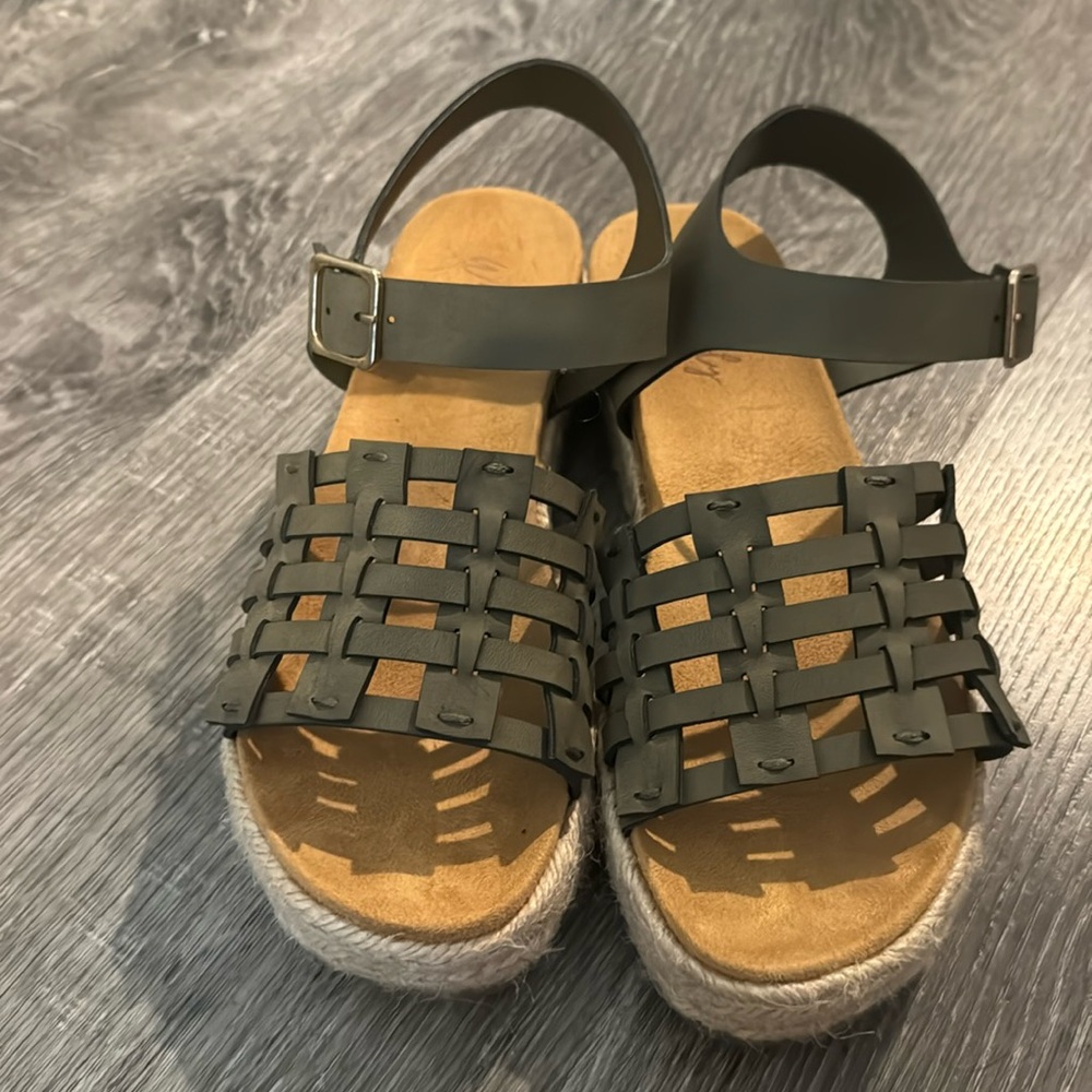 Platformed dark green sandals